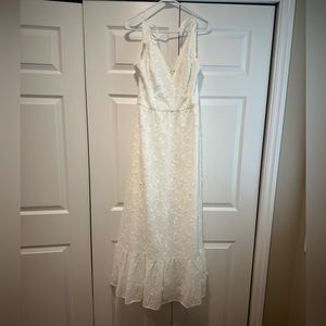 White floor length floral dress perfect for the bride to be!